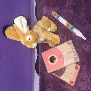 Set of Stuffed Bunny, PopIts Bracelet, and Coin Toss Game